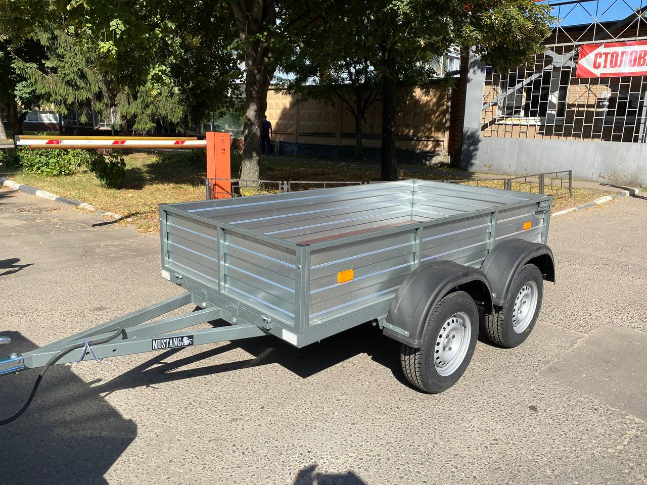 картинка Двухосный автомобильный прицеп от магазина Одежда+