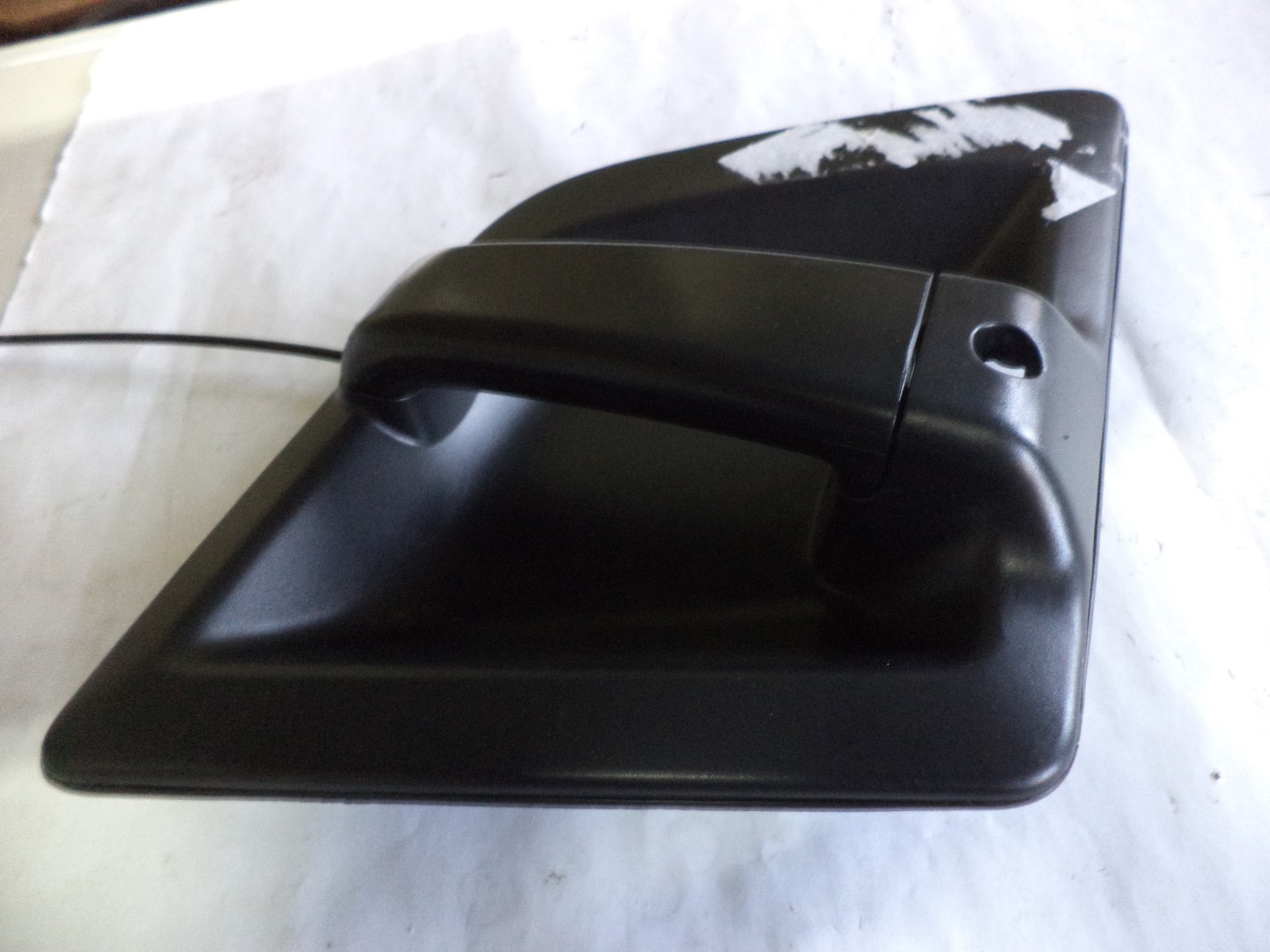 картинка Ручка двери наружная нового образца правая 860122445 /автокран QY25K5-1/ от магазина Одежда+